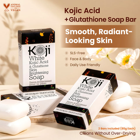 Two bars of Kojiwhite Kojic Acid and Glutathione skin brightening soap, showing the soap's packaging and brand label.
