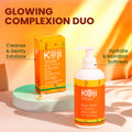 Two bars of Kojiwhite kojic acid and papaya skin brightening soap with fresh papaya slices in the background.